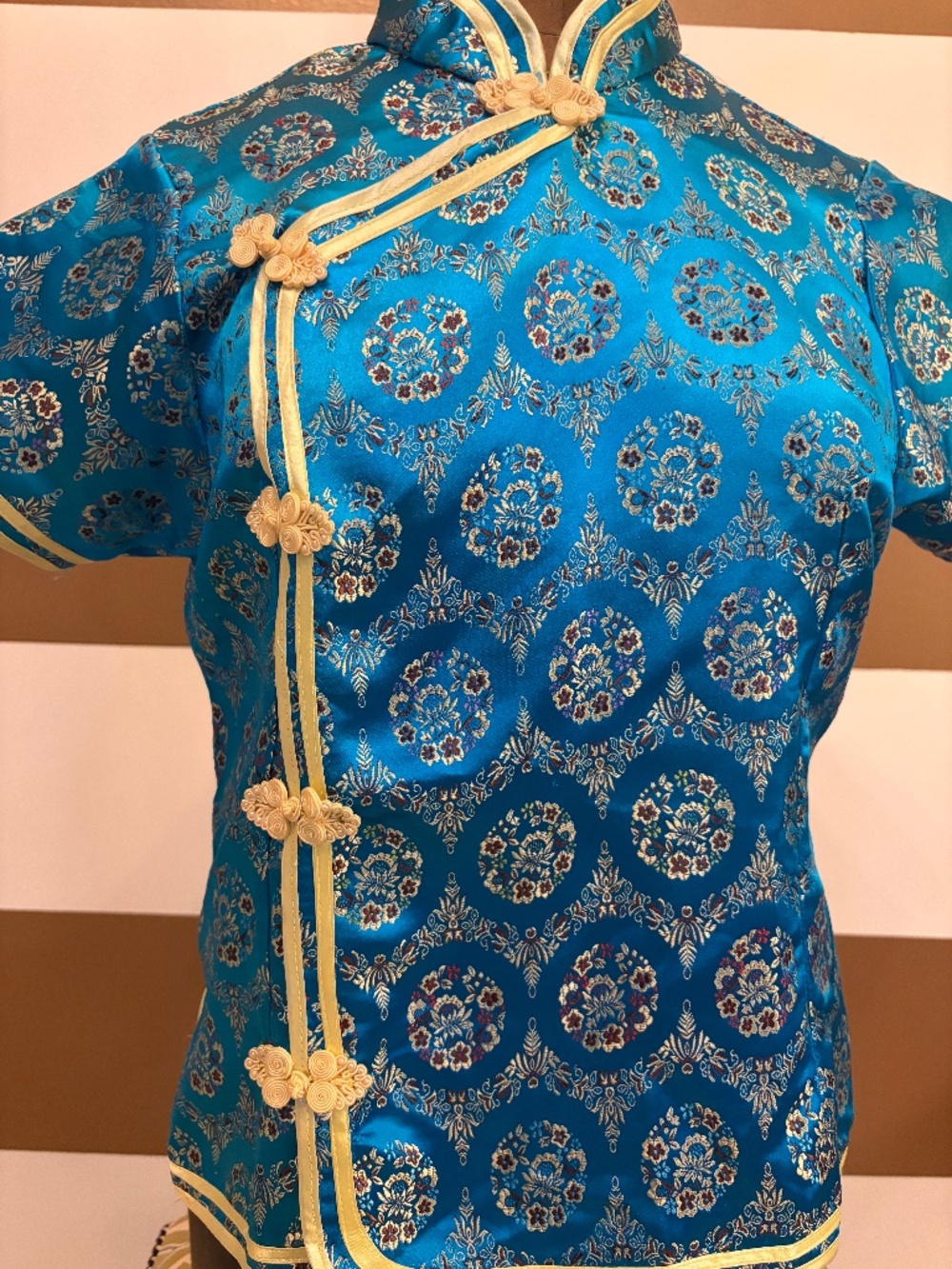 Intricately designed teal and yellow asian inspired top. Small.